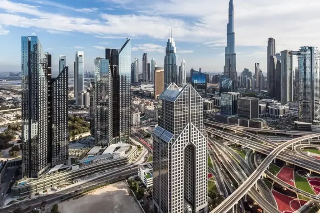 Aerial view of Dubai showcasing its skyline, featuring iconic skyscrapers and urban layout